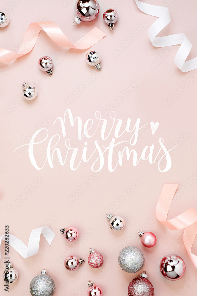 Beautiful Christmas background with shiny balls and ribbons in pastel