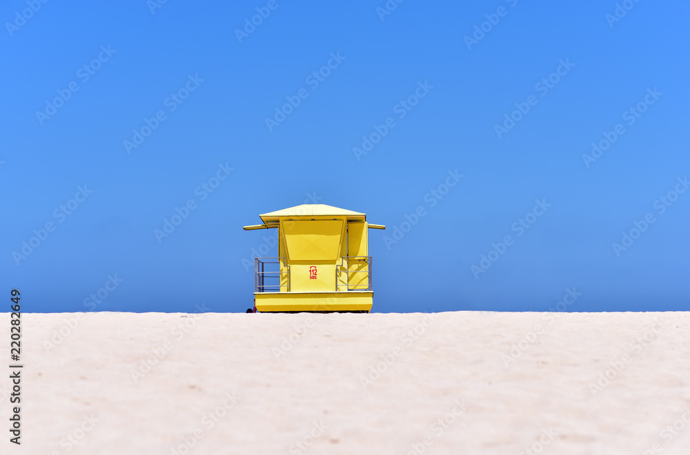 Yellow Lifeguard hut on Corralejo Beach in Fuertevantura Island, Canary Islands, Spain Yellow Lifeguard hut on Corralejo Beach in Fuertevantura Island, Canary Islands, Spain