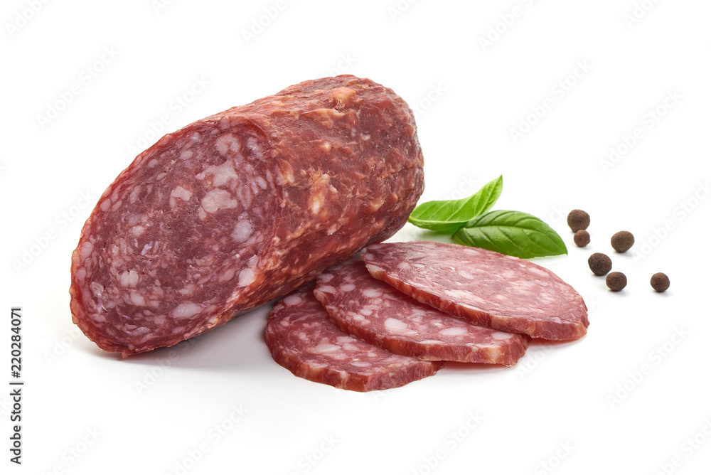 Salami smoked sausage, basil leaves and peppercorns, isolated on white background.