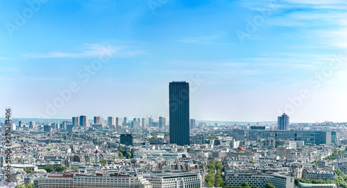 Aerial panoramic view of Montpernasse skyscraper and Paris skyline in sunny day