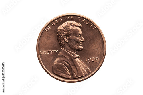 USA one cent penny coin with a portrait image of Abraham Lincoln cut out and isolated on a white background photo
