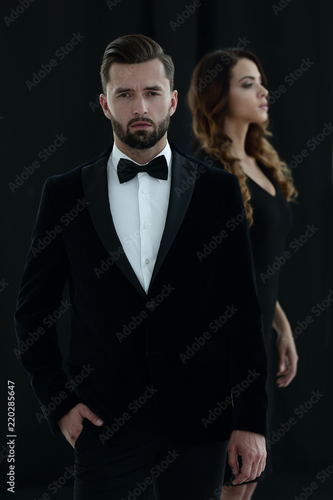 gentleman with his girl posing in the studio gentleman with his girl posing in the studio