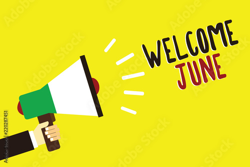 Text sign showing Welcome June. Conceptual photo Calendar Sixth Month Second Quarter Thirty days Greetings Man holding megaphone loudspeaker yellow background message speaking loud © Artur