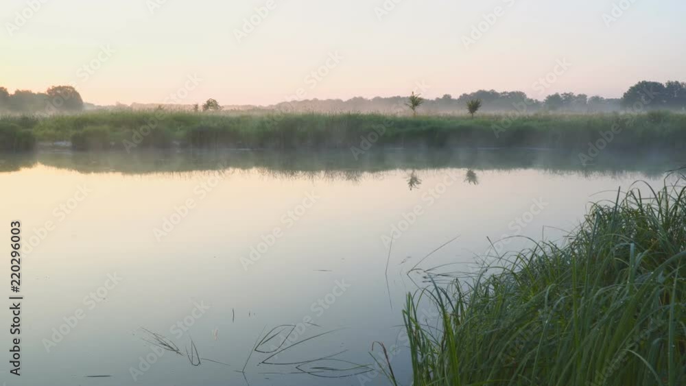 Morning fog on a quiet beautiful lake Morning fog on a quiet beautiful lake