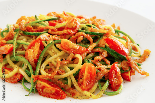 vegetable spaghetti matriciana sprinkled with pepper