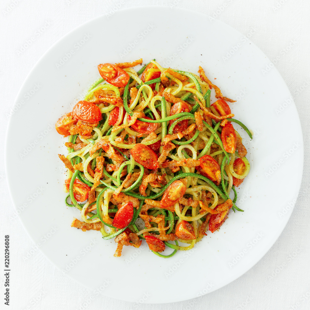 zucchini spaghetti matriciana sprinkled with pepper zucchini spaghetti matriciana sprinkled with pepper
