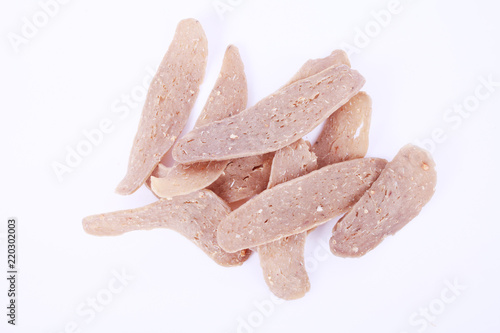 Home made kelantan raw fish cracker on white background. photo