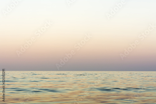 the night sea with waves and reflection of the sky after sunset  sea sky at sunset time  nature abstract background