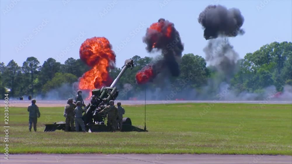 Huge explosions accompany an artillery display by the U.S. Army. Stock ...