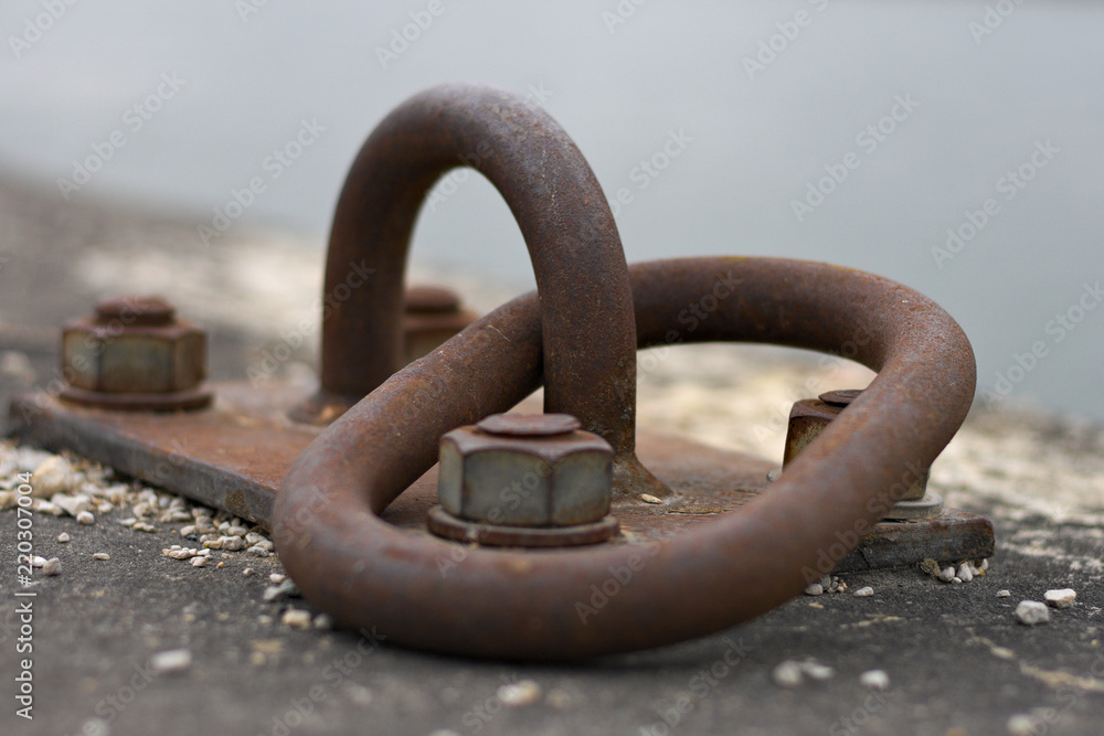 Naklejka premium an old rusty mooring ring