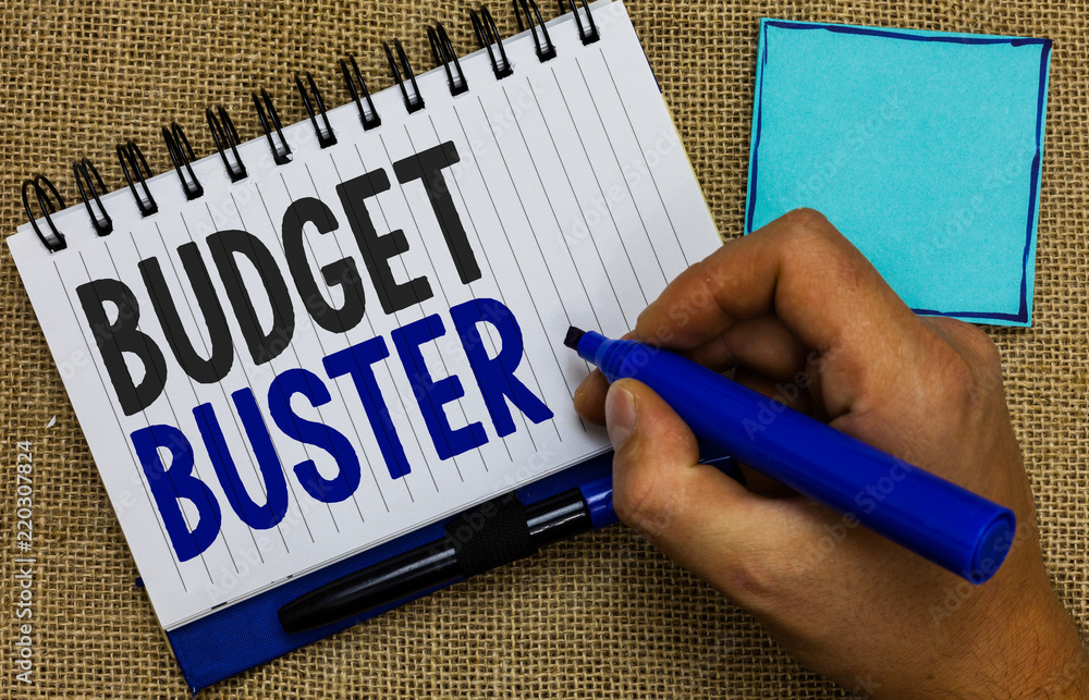Word writing text Budget Buster. Business concept for Carefree Spending Bargains Unnecessary Purchases Overspending Man holding marker notebook page reminder communicate ideas Jute background Word writing text Budget Buster. Business concept for Carefree Spending Bargains Unnecessary Purchases Overspending Man holding marker notebook page reminder communicate ideas Jute background
