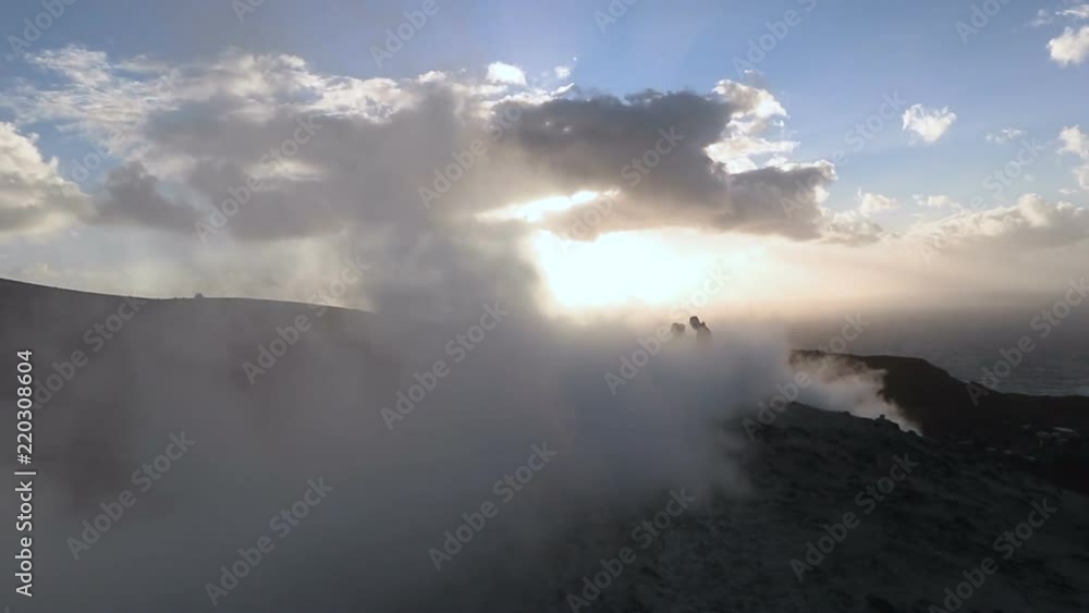 sunset on the crater of Vulcano with sulfur fumaroles, Aeolian Islands, Sicily sunset on the crater of Vulcano with sulfur fumaroles, Aeolian Islands, Sicily