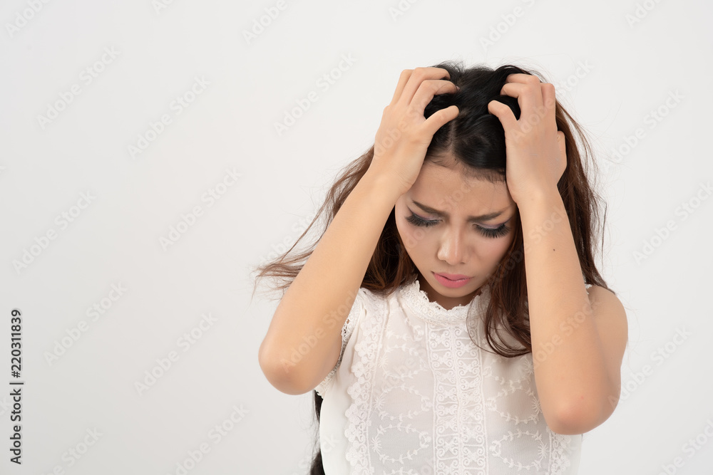 portrait of stressed sick asian woman with headache; ill business woman suffers from vertigo, migraine, hangover, dizziness, health care concept on white background. Free from copy space. portrait of stressed sick asian woman with headache; ill business woman suffers from vertigo, migraine, hangover, dizziness, health care concept on white background. Free from copy space.
