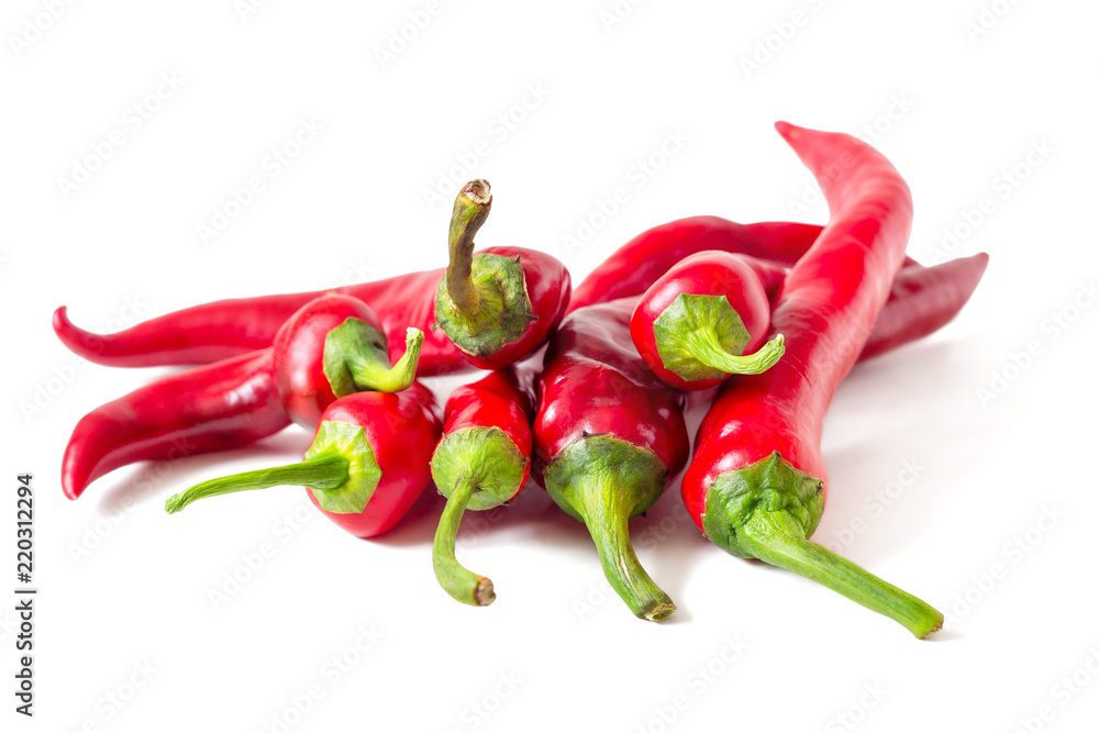 New crop of hot red chili peppers isolated on white background. Seasoning for Mexican cuisine New crop of hot red chili peppers isolated on white background. Seasoning for Mexican cuisine