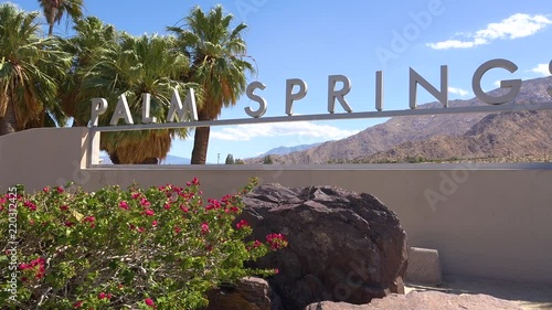 Establishing shot of the welcome to Palm Springs sign, California.