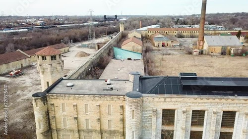 Aerial of the derelict and abandoned Joliet prison or jail, a historic site since construction in the 1880s. photo