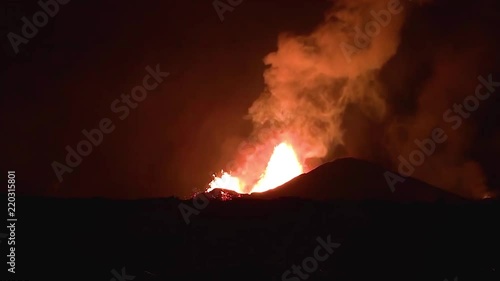 Amazing night footage of the 2018 eruption of the Kilauea volcano on the main island of Hawaii including waves of lava. photo