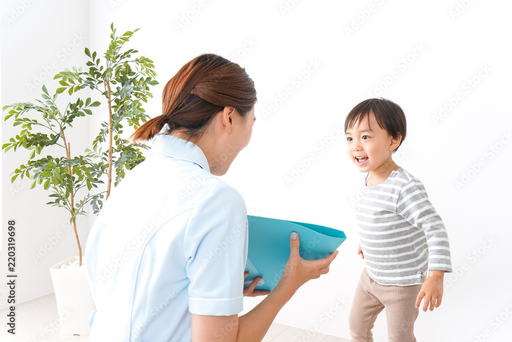 Obraz premium 看護師と男の子