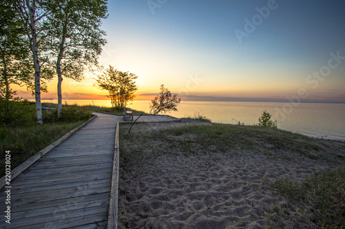 MIchigan Boardwalk Scenic Sunset. Sunset on the coast of Lake Superior in the Hiawatha National Forest. Brimley, Michigan.
