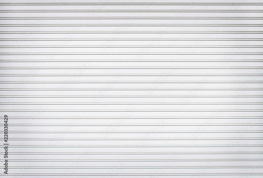 Texture rolling steel door or roller shutter door for white grey background Texture rolling steel door or roller shutter door for white grey background