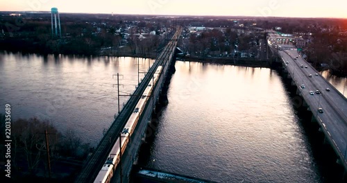 Wallpaper Mural Cinematic Aerial Flyover View of Train Passing Over River by danelgo. Inspire 2 and Zenmuse X5S Lens Torontodigital.ca