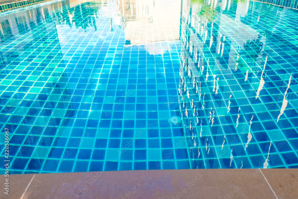 Luxury smimming pool inside of low rise condominium building Luxury smimming pool inside of low rise condominium building