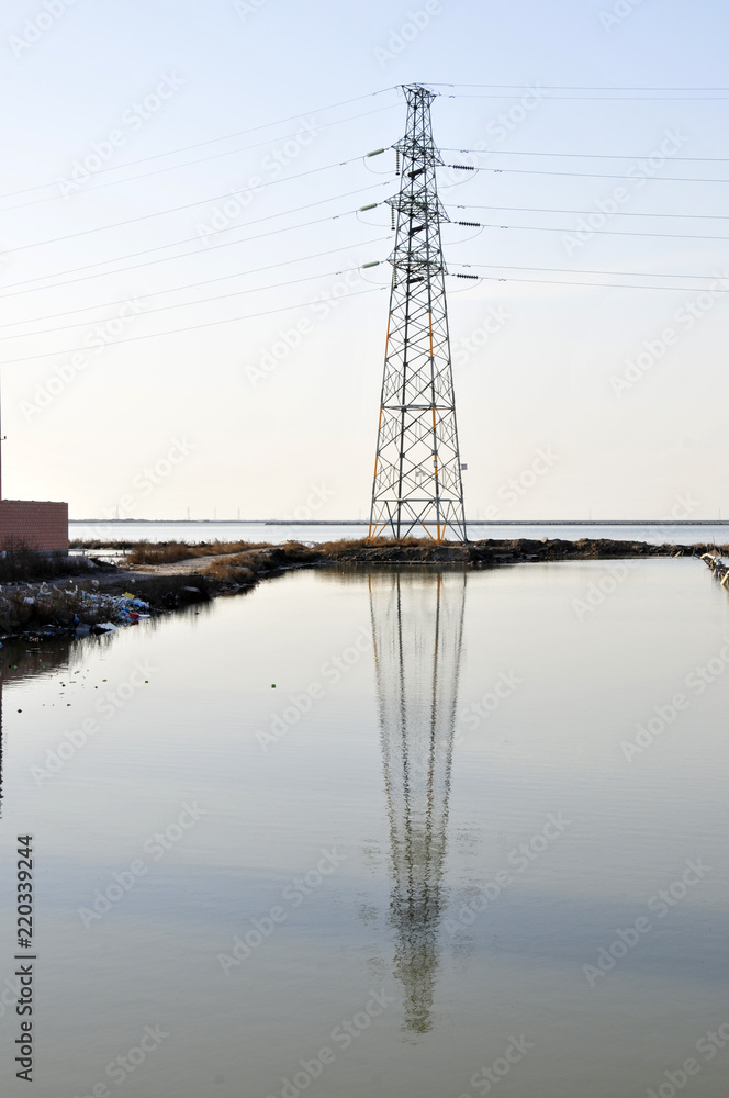 Pylon reflection in the water