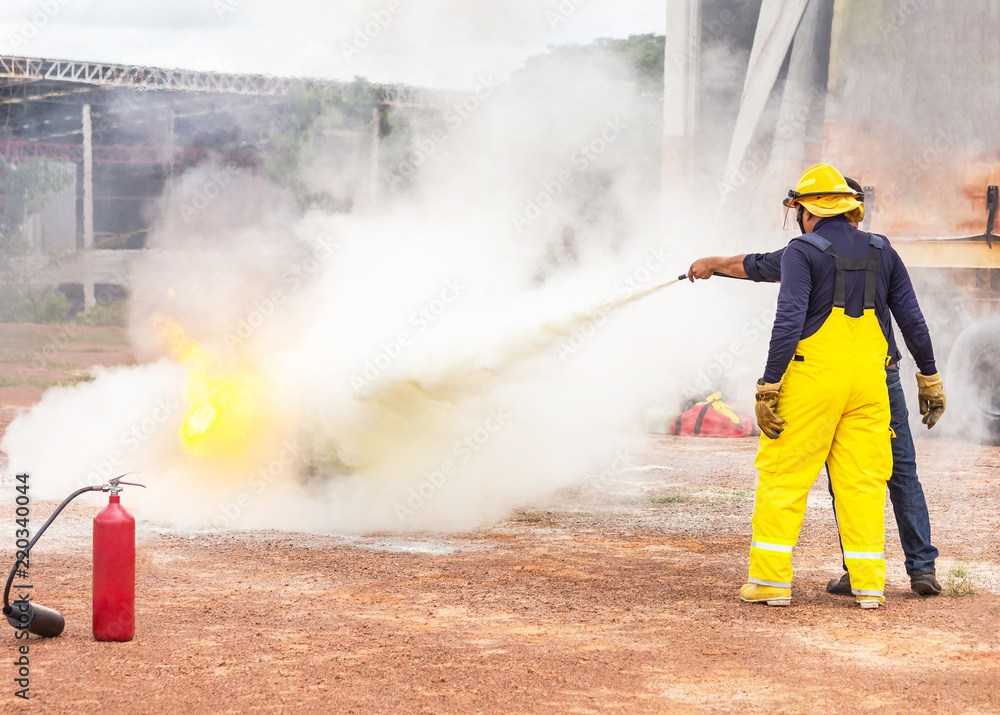 Fototapeta premium Basic fire fighting training and fire drill evacuation