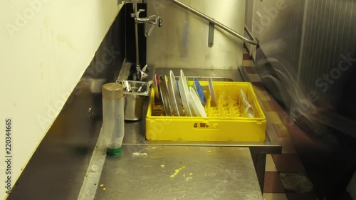 Timelapse of dishwashing in the kitchen of a restaurant ZOOM IN.