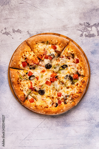 Vegetarian pizza with mushrooms, vegetables, cheese