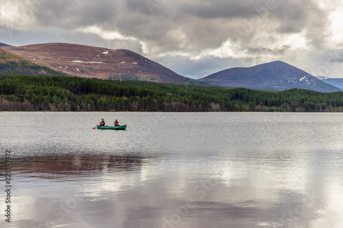 People canoeing in Loch Morlich, in the Highlands of Scotland