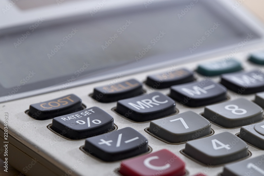 Close-Up Of Old Dirty Calculator On Table Close-Up Of Old Dirty Calculator On Table