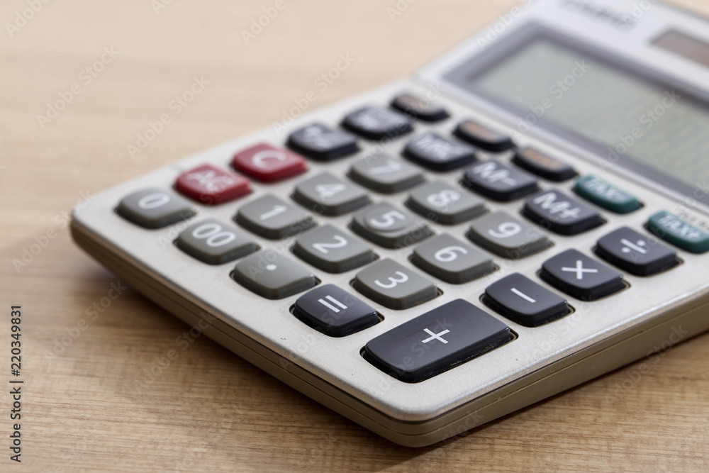 Close-Up Of Old Dirty Calculator On Table Close-Up Of Old Dirty Calculator On Table