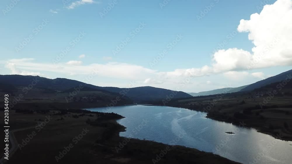 aerial view of the Pyrenean Lake of Puyvalador in Capcir filmed with drone, Pyrenees orientales in southern of France aerial view of the Pyrenean Lake of Puyvalador in Capcir filmed with drone, Pyrenees orientales in southern of France