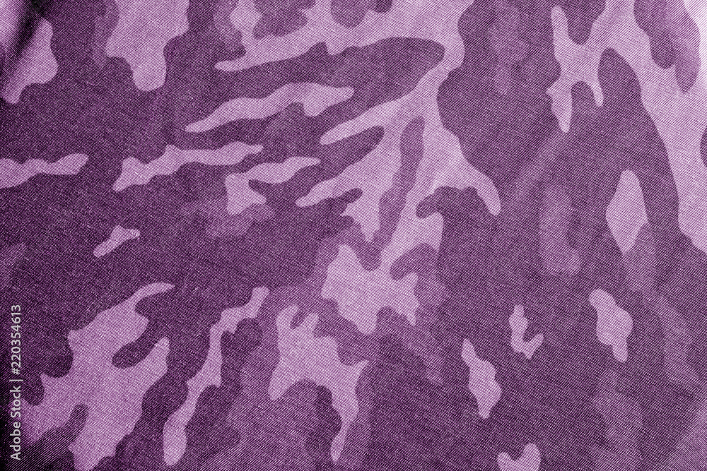 Old camouflage cloth with blur effect in purple tone. Old camouflage cloth with blur effect in purple tone.