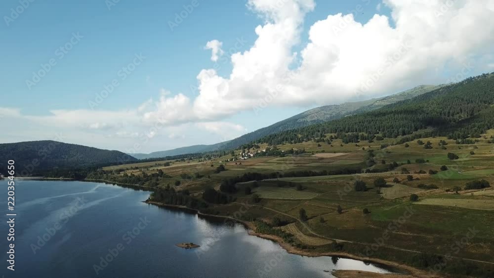 aerial view of the Pyrenean Lake of Puyvalador in Capcir filmed with drone, Pyrenees orientales in southern of France aerial view of the Pyrenean Lake of Puyvalador in Capcir filmed with drone, Pyrenees orientales in southern of France