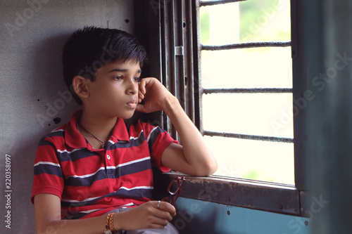 Indian Little boy traveling in train
