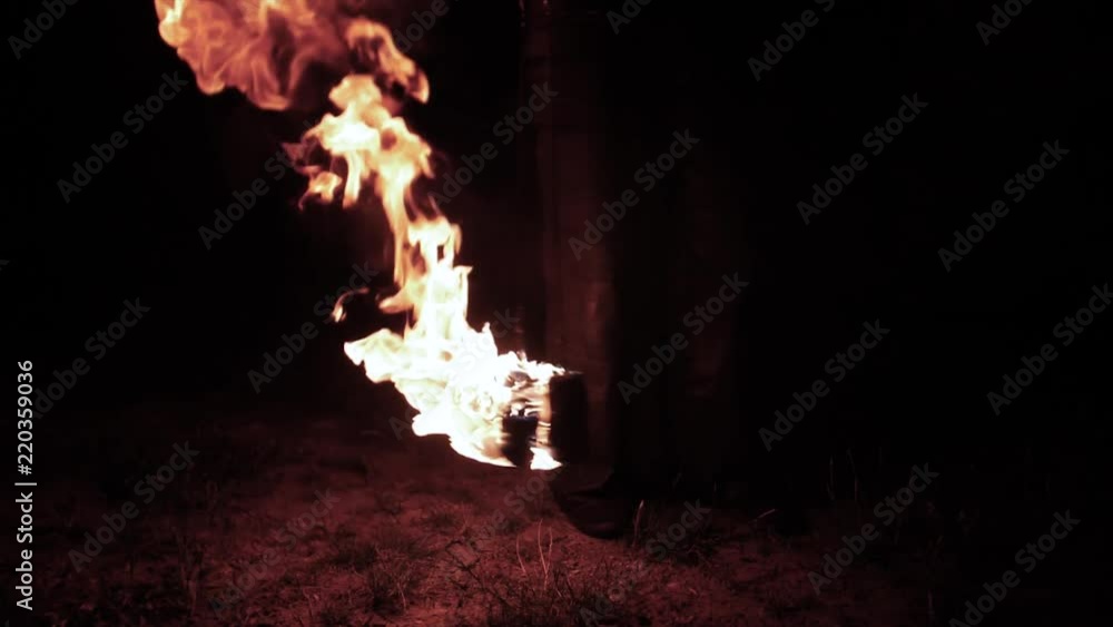 Superslow, A Fire Artist Moves His Fire Pois Right And Left In The Dark ...