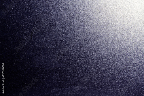 Ground glass texture in blue color with light in corner