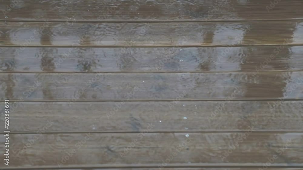 It rains on a wooden decoration It rains on a wooden decoration