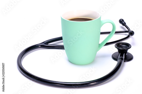 stethoscope and coffee mug photo