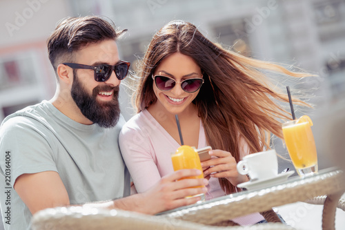 Beautiful couple having coffee on a date