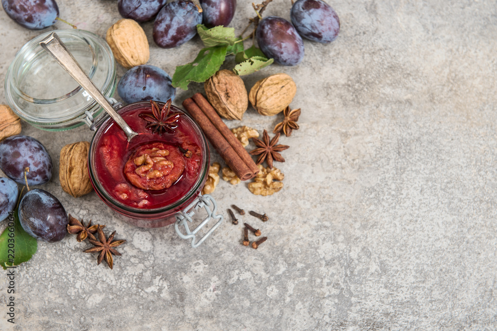 Plums marmalade walnuts spices in jar Fruit jam Plums marmalade walnuts spices in jar Fruit jam