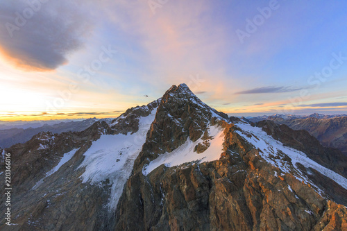 Aerial view of Monte Disgrazia at sunset, Valmalenco, Val Masino, Valtellina, Lombardy, province of Sondrio photo