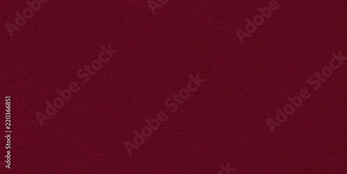 Colored  skin texture, natural or faux maroon leather background, closeup.