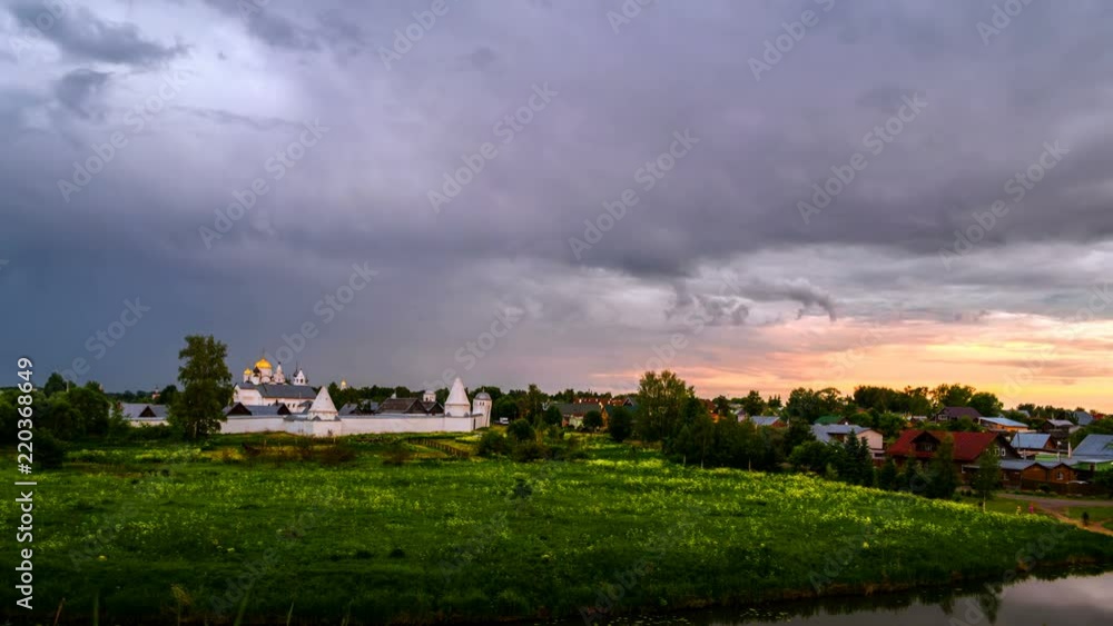 Suzdal, Russia. Aerial view of Intercession (Pokrovsky) Monastery in Suzdal, Russia during a cloudy evening. Golden tour trip in Russia, time-lapse of sunset view Suzdal, Russia. Aerial view of Intercession (Pokrovsky) Monastery in Suzdal, Russia during a cloudy evening. Golden tour trip in Russia, time-lapse of sunset view