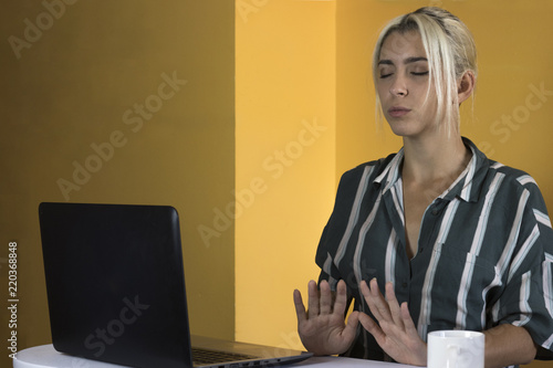 Office worker trying to relax on a bad day photo