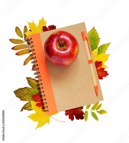 Notebook, pen and apple wit...