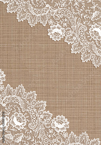 Old lace corner on  cloth background