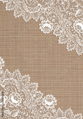 Old lace corner on  cloth background